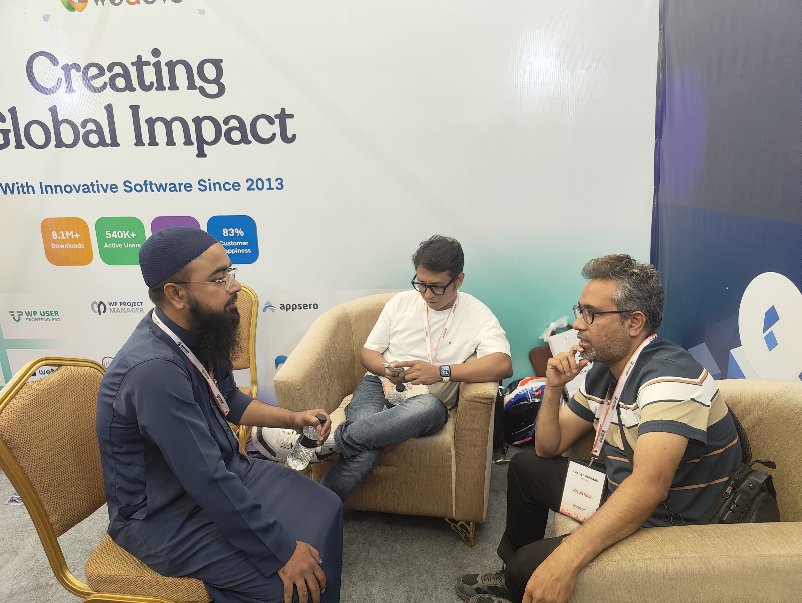 Networking on weDevs Stall at WodCamp Dhaka 2025